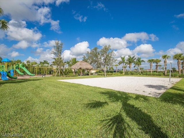 view of property's community with a gazebo, playground community, a lawn, and volleyball court