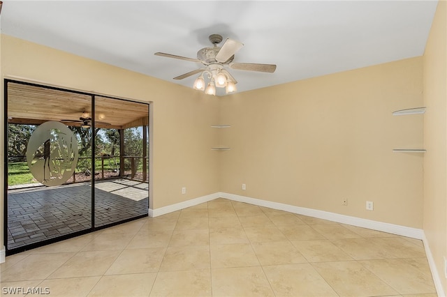 unfurnished room featuring light tile flooring and ceiling fan