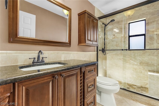 bathroom featuring walk in shower, toilet, vanity, and tile flooring