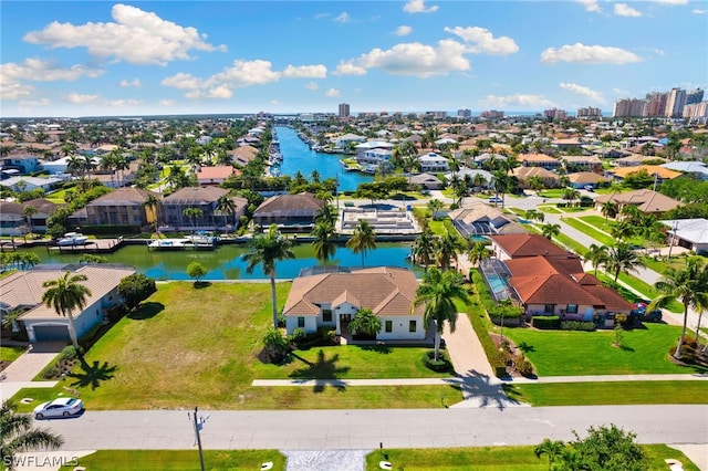 birds eye view of property featuring a water view