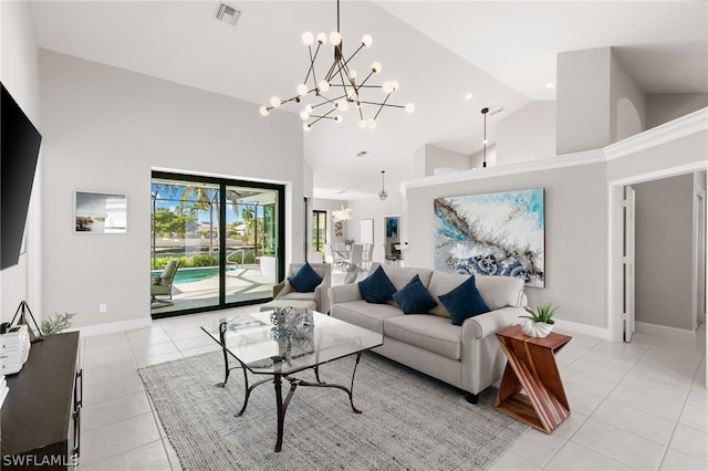 tiled living room featuring high vaulted ceiling and an inviting chandelier