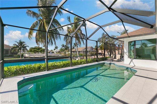 view of pool featuring a patio area and a lanai