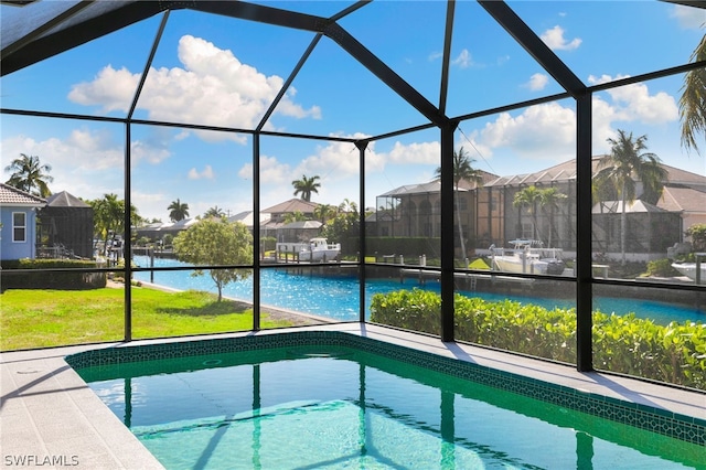 view of pool featuring a yard and a lanai