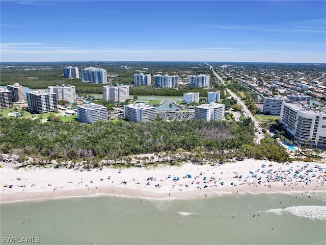 aerial view featuring a water view and a view of the beach