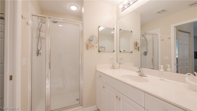 14541 Legends Blvd N Unit 206, Fort Myers, FL 33912 - bathroom with vanity and a shower with door