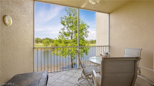 balcony featuring ceiling fan