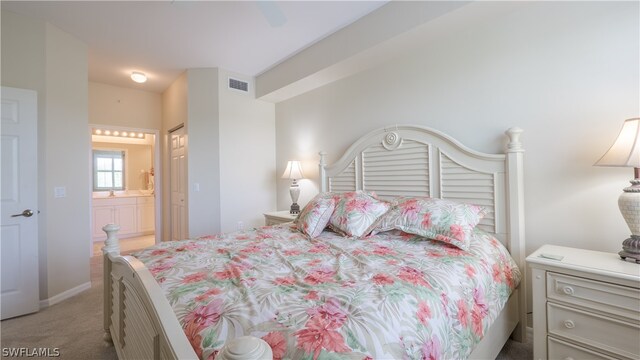 14541 Legends Blvd N Unit 206, Fort Myers, FL 33912 - bedroom featuring light colored carpet and ensuite bathroom