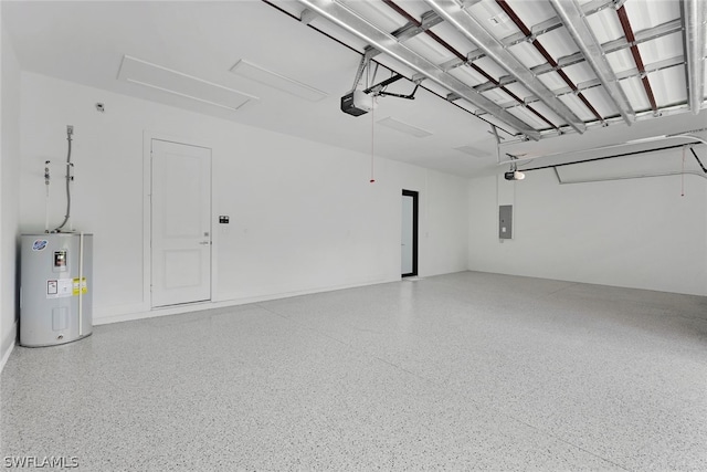 garage featuring electric water heater and a garage door opener