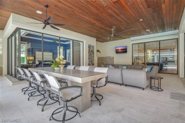 exterior space with wooden ceiling and ceiling fan