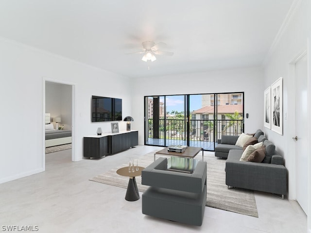 living room with ornamental molding, light tile patterned floors, and ceiling fan