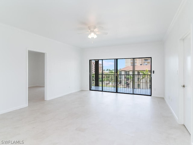 spare room with crown molding and ceiling fan