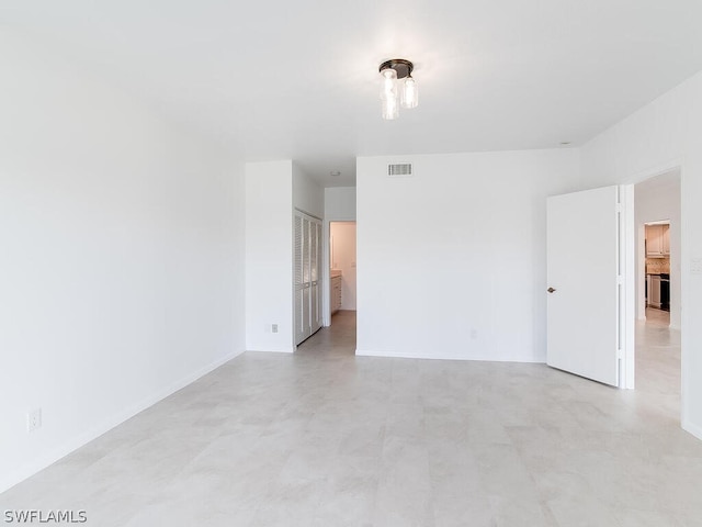 view of tiled spare room