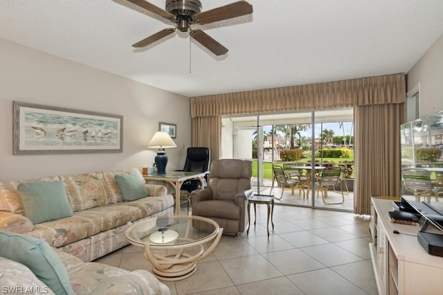 tiled living room featuring ceiling fan