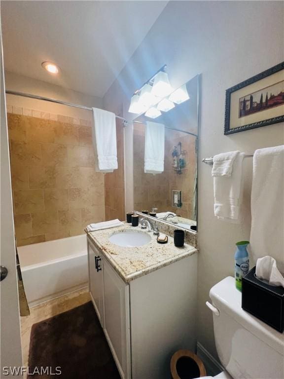 full bath featuring toilet, shower / bathing tub combination, and vanity