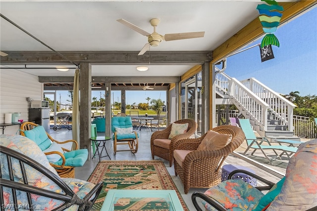 view of patio with ceiling fan and outdoor lounge area