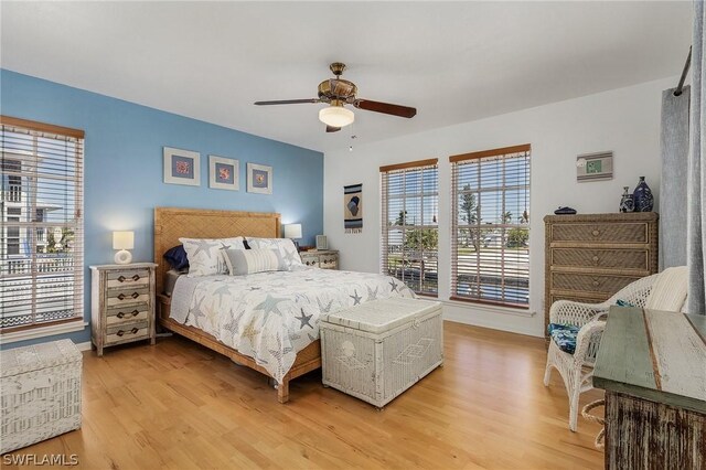 bedroom featuring ceiling fan and light hardwood / wood-style floors