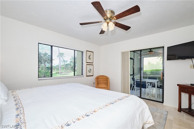 bedroom with access to exterior, ceiling fan, and multiple windows