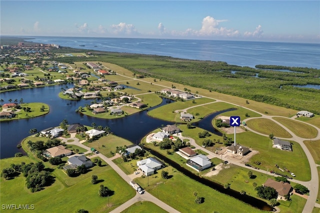 bird's eye view with a water view