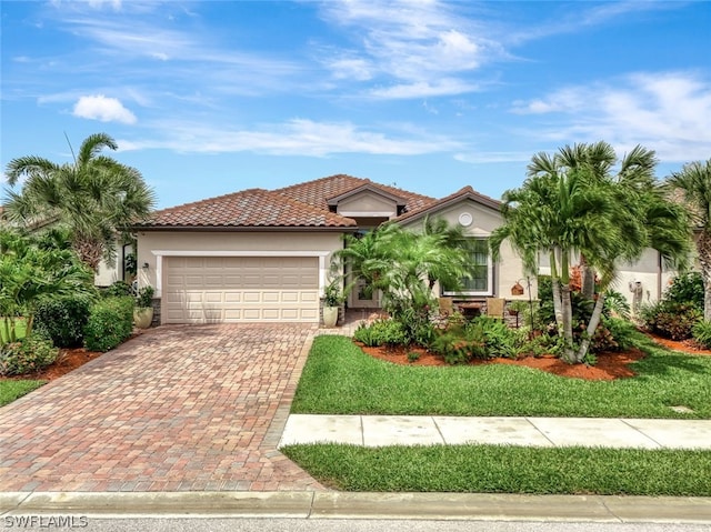 mediterranean / spanish-style house featuring a garage