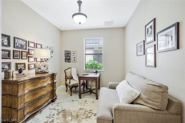 sitting room featuring light colored carpet