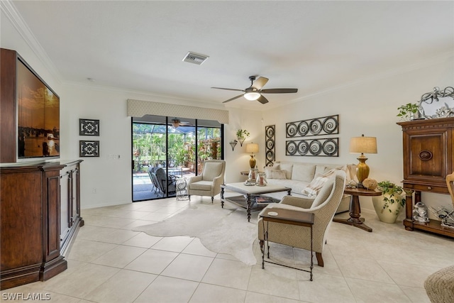 tiled living room featuring ceiling fan and crown molding