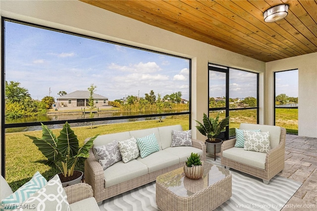 sunroom featuring wood ceiling