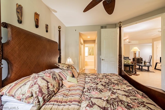 carpeted bedroom with ceiling fan