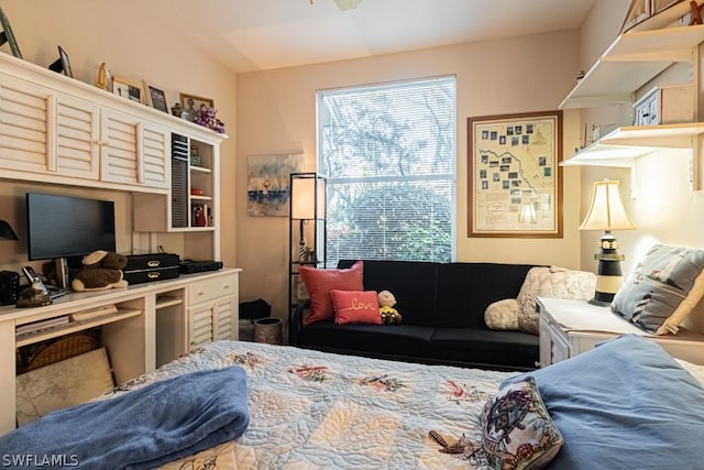 bedroom with vaulted ceiling