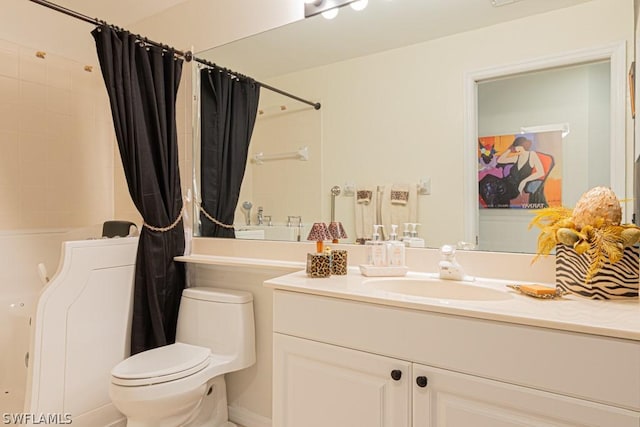 full bathroom featuring vanity, toilet, and shower / bath combo with shower curtain