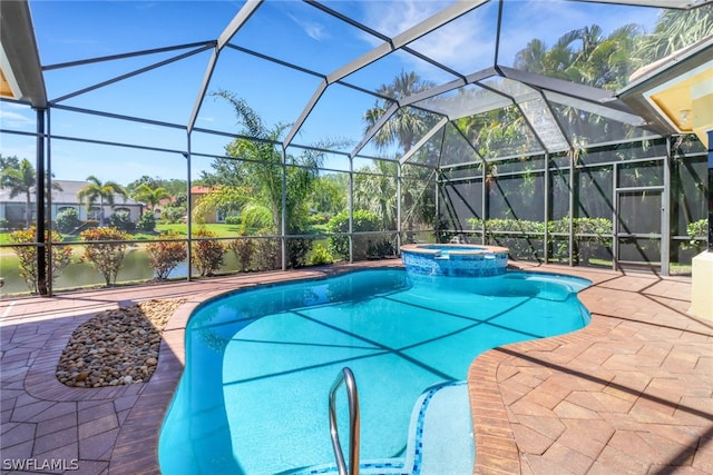 view of pool with an in ground hot tub, a patio area, and a lanai