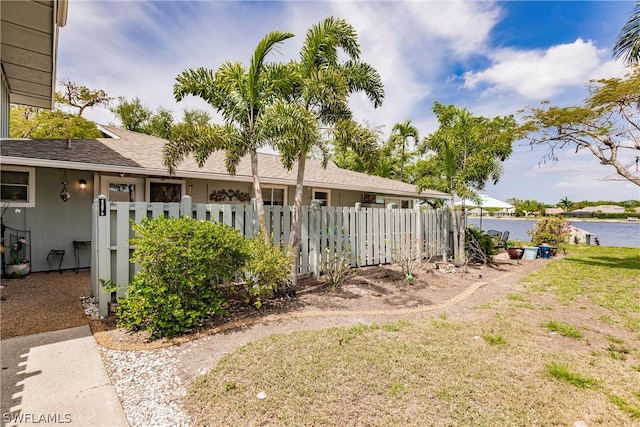 exterior space with a water view