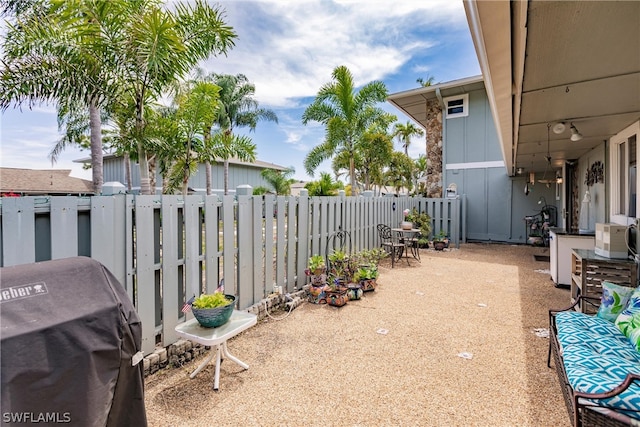 view of terrace featuring a grill