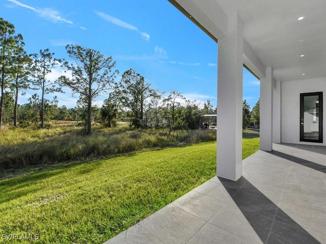 view of yard with a patio area