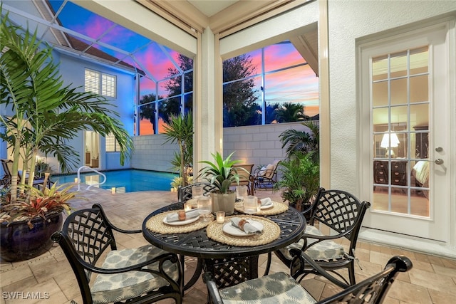 interior space with fence and a fenced in pool