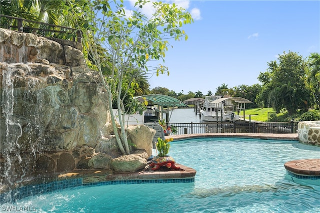 view of pool featuring pool water feature