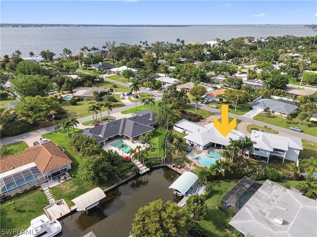 drone / aerial view featuring a water view