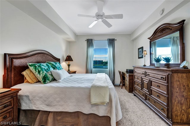 bedroom with light colored carpet and ceiling fan