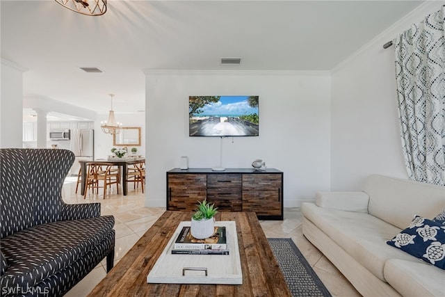 living room featuring decorative columns, an inviting chandelier, ornamental molding, and light tile patterned flooring