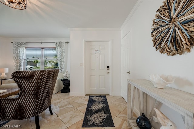 entryway featuring ornamental molding