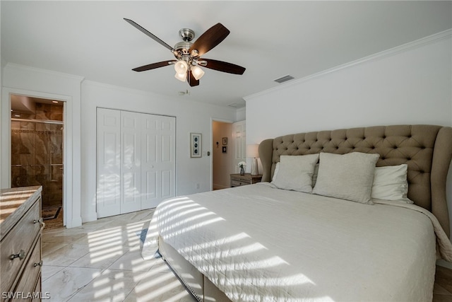 bedroom featuring ceiling fan, a closet, crown molding, and ensuite bath