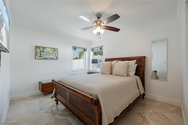 tiled bedroom with ceiling fan and ornamental molding