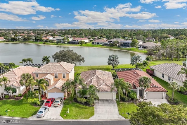 bird's eye view with a water view