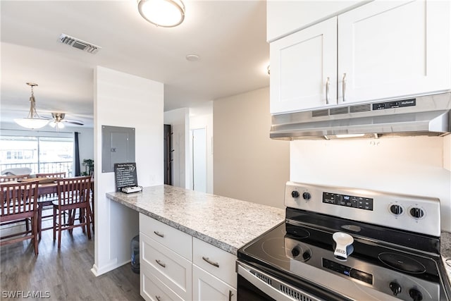 kitchen with hanging light fixtures, light hardwood / wood-style flooring, ceiling fan, stainless steel electric range oven, and white cabinetry