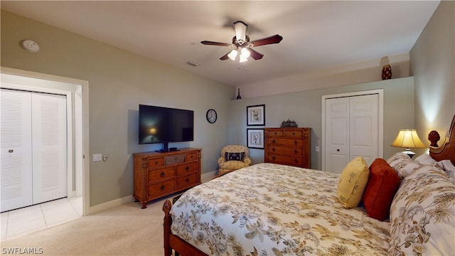 bedroom with light carpet and ceiling fan