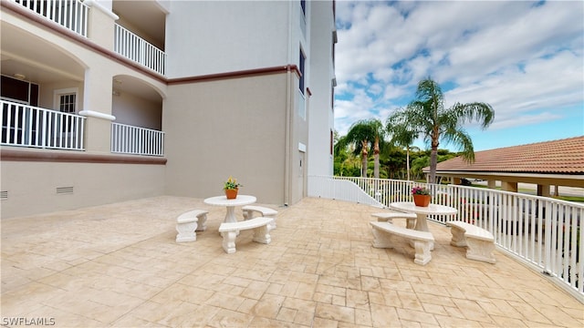 view of patio / terrace featuring a balcony