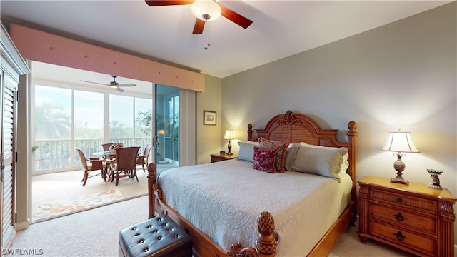 carpeted bedroom featuring access to outside and ceiling fan