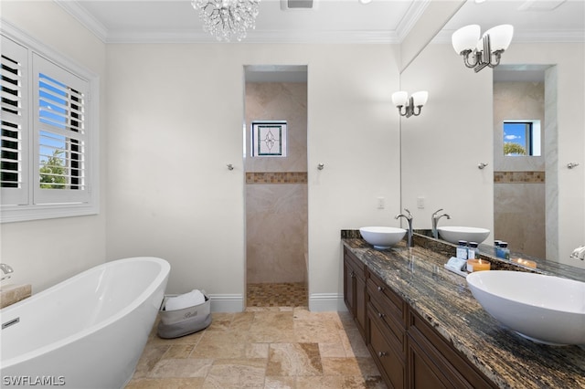 bathroom with a notable chandelier, crown molding, and vanity