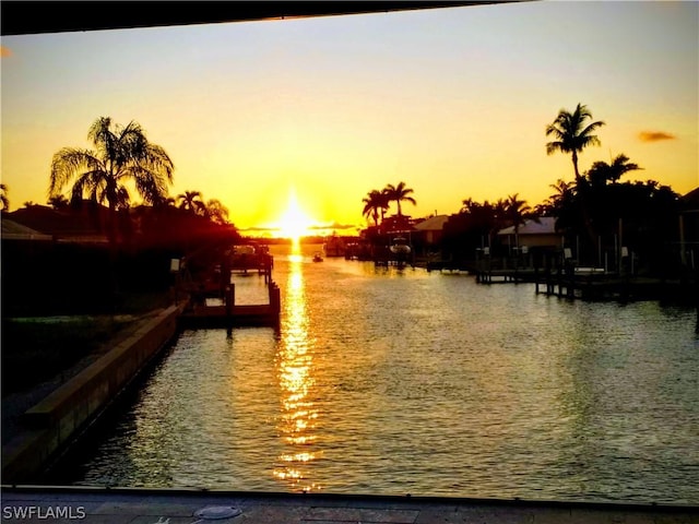 property view of water featuring a dock