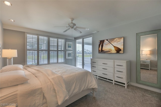 carpeted bedroom featuring ceiling fan and access to outside