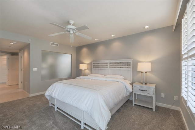 carpeted bedroom featuring ceiling fan